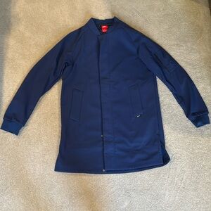 Nike Futbol FC extended length jacket.
